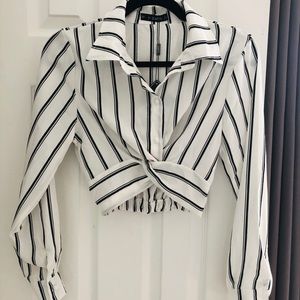 Cropped button up blouse.